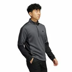 Adidas Colorblock Quarter Zip Sweatshirt -Golf Clothing Shop HC5573 APP on model walking white 700x700